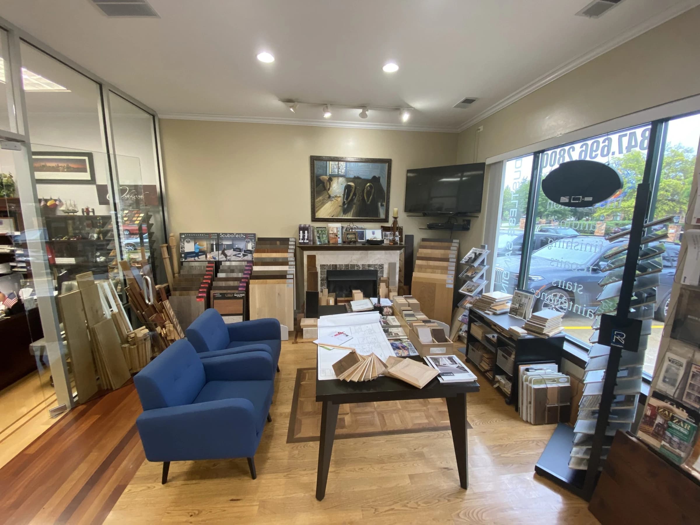 Sample displays and a consultation table in Ace’s showroom
